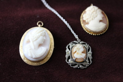 These cameos can be worn as pins are pendants.