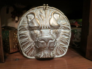 A wooden Timothy Woods lion purse that I love!