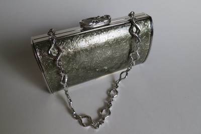 This is a much later model of Judith Leiber purse. 