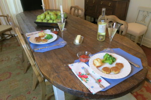 Salmon patties, a fresh vegetable, homemade rolls, and a great white wine combine for a filling and delicious meal!