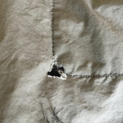 A hole developed at the edge of these shorts' pocket.