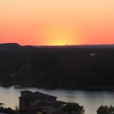 Sunset over the Colorado River in Marble Falls, Texas.