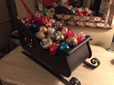 Old family ornaments get a new use filling a sleigh.