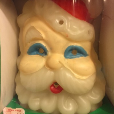 A 5" glowing Santa candle still in the box, with Howard's price tag! Very vintage!