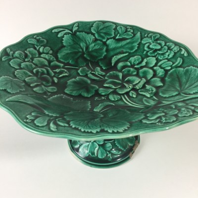 This Majolica footed plate is a lively green color. 
