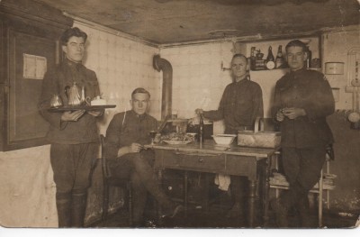 Granddad working in the officer's mess, He is third from the left.