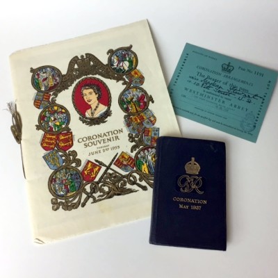 Commemorative Coronation items from 1953 include a souveir program given to guests staying at Groevenor House at the time of hte inauguration, a ticket for the parade, and a souvenir Bible.