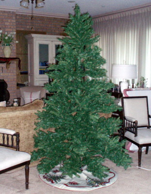 Before you add lights or ornaments, fluff the tree branches so that they look full and natural.