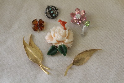Floral and leaf figural pins.