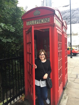 Every trip to London requires a photo at a iconic, red telephone booth. 