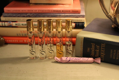 Bond No. 9 offers small perfume vials they call BonBons, which are the standing bottles. The small pink wrapped is a store sample.