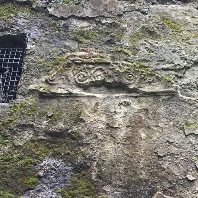 Carved stone in the wall of the castle.